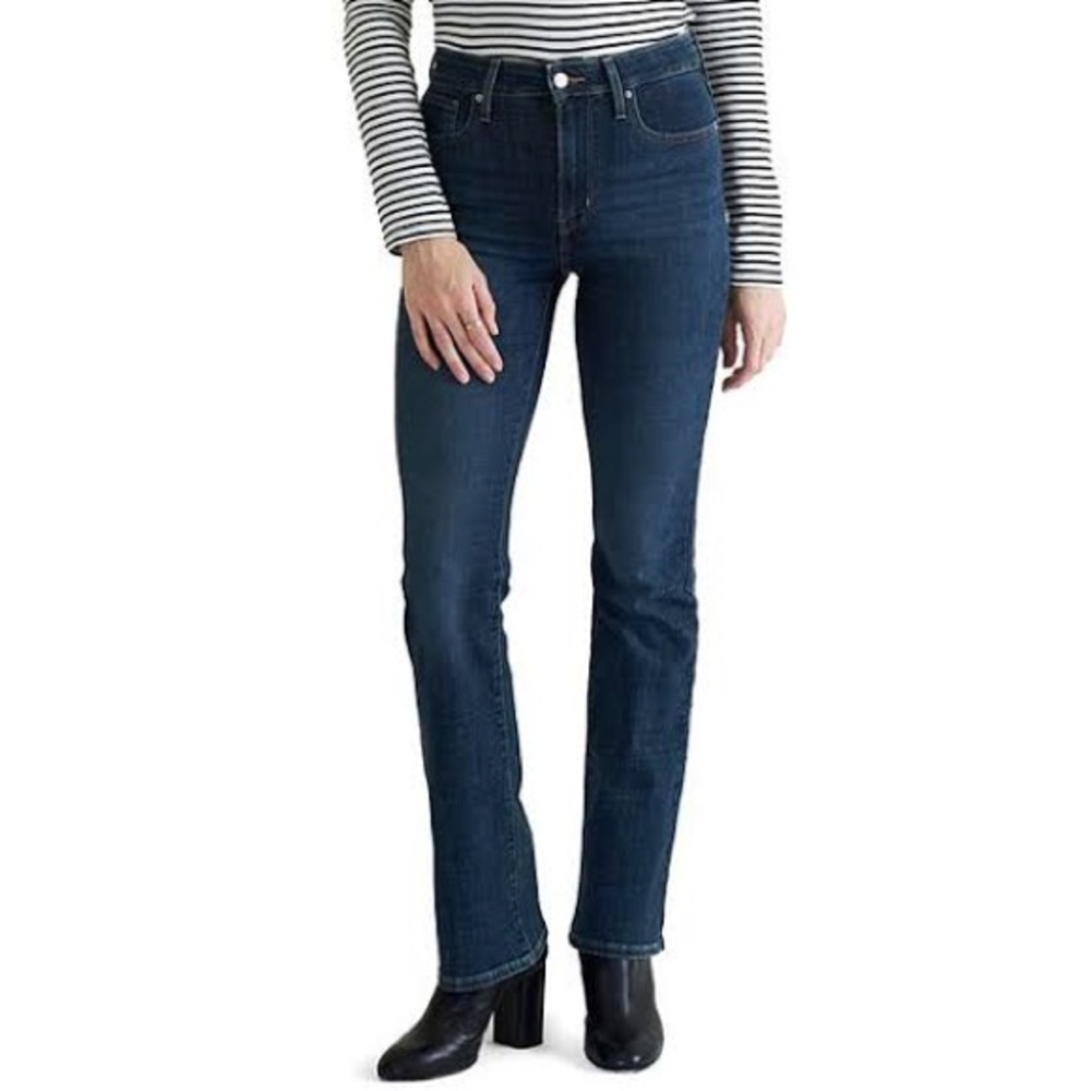 Bootcut dark washed Levis jeans.